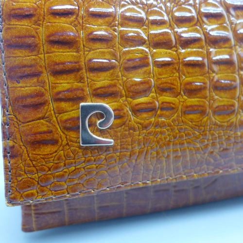 661 - A crocodile purse/clutch bag