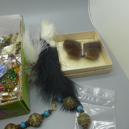 663 - A tray of costume jewellery, compact, plated belt, etc.