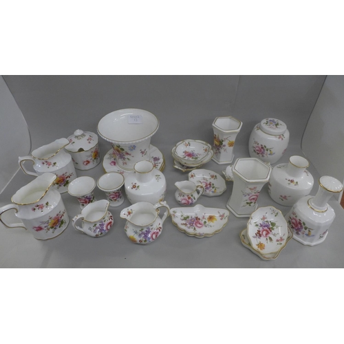 676 - A large collection of Royal Crown Derby Derby Posies china, jugs, pin dishes, vases, ginger jar, etc... 