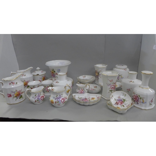 676 - A large collection of Royal Crown Derby Derby Posies china, jugs, pin dishes, vases, ginger jar, etc... 