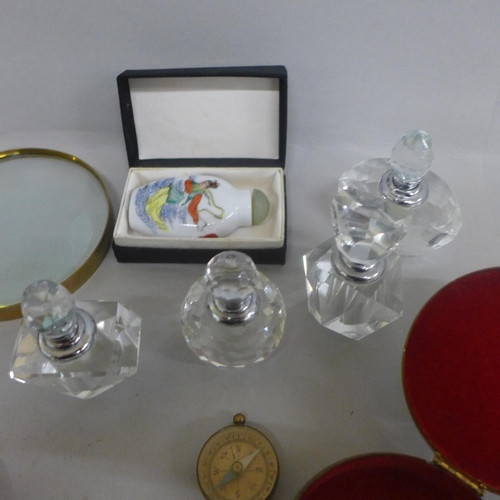 685 - Perfume bottles, a cold painted owl figure, magnifying glass, etc.