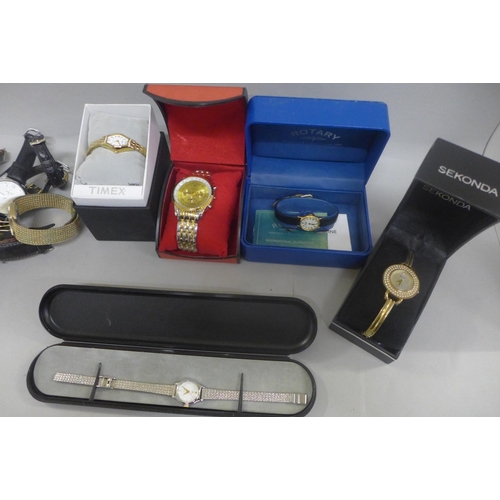 694 - A collection of lady's and gentlemen's wristwatches including Rotary, Seiko, some boxed