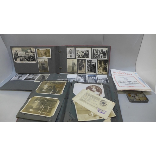 721 - Three albums of Edwardian black and white photographs, theatre programmes and a small tin of US and ... 