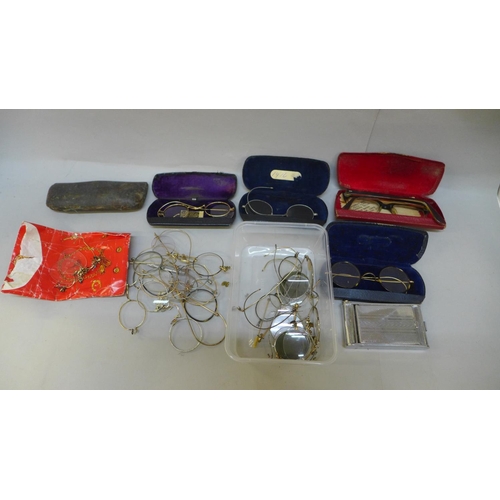 723 - A collection of spectacles, some complete in case and in parts