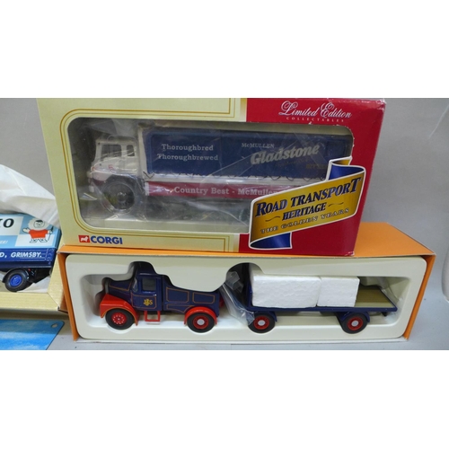 738 - Four Corgi model vehicles, boxed and a modern tin sign