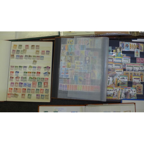 755 - A box of single country collections of stamps; six albums and an album of Historic Stamps of America