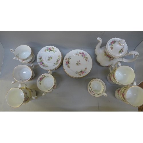 757 - A Royal Albert Moss Rose coffee set including cup and saucers, side plates, mugs, etc.
 **PLEASE NOT... 