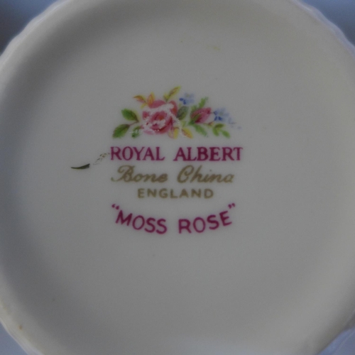 757 - A Royal Albert Moss Rose coffee set including cup and saucers, side plates, mugs, etc.
 **PLEASE NOT... 