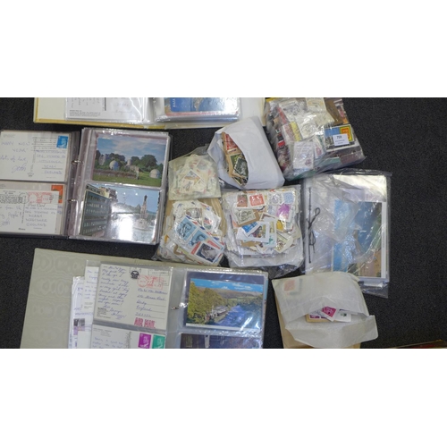 759 - A collection of postcards and stamps