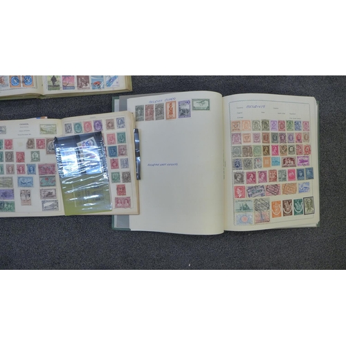 761 - A box of assorted stamp albums and a scrap book