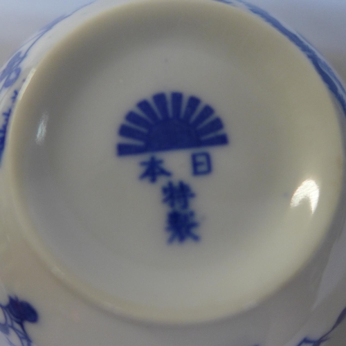 775 - A Japanese six setting blue and white tea set