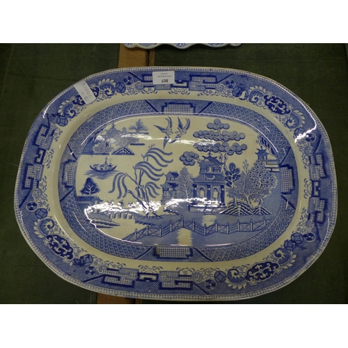 807 - A blue and white Willow pattern meat plate and a cheese dish