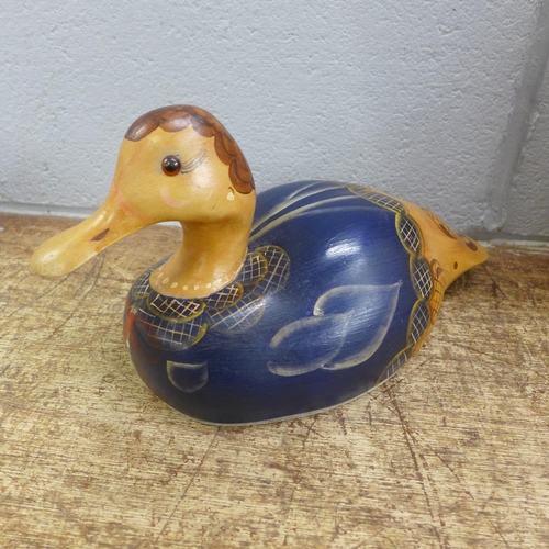 840 - A carved wooden duck by Randy Tull, signed, 'World Champion Carver', Dallas, TX, and two others