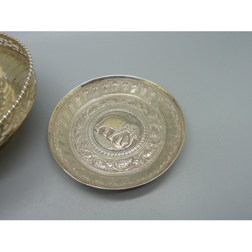 854 - An Indian white metal dish and a hallmarked silver dish, (47g and 75g)