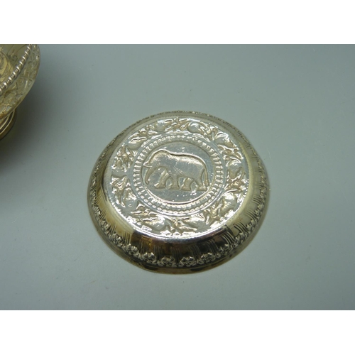 854 - An Indian white metal dish and a hallmarked silver dish, (47g and 75g)