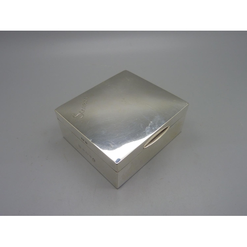 858 - A silver cigarette box, 86mm wide, total weight 221g, personalised