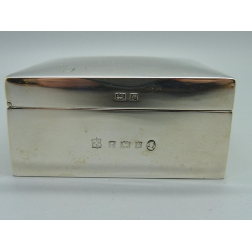 858 - A silver cigarette box, 86mm wide, total weight 221g, personalised