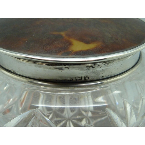 860 - A silver and tortoiseshell topped cut glass jar, Birmingham 1926