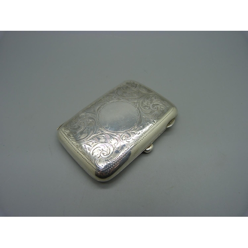 867 - A hand engraved silver cigarette case, Birmingham 1916, 49g