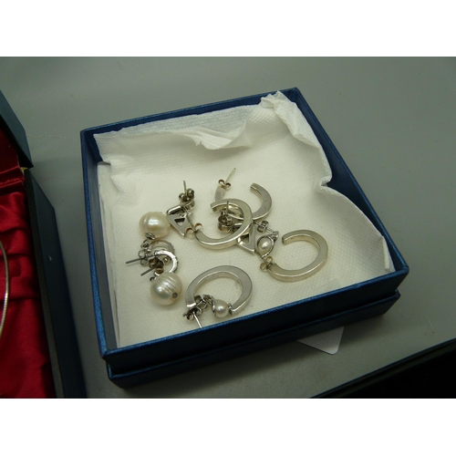 896 - A silver bracelet, a ring, silver earrings, etc.