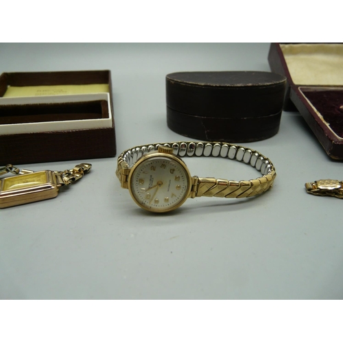 904 - Three lady's 9ct gold wristwatches on plated bracelets, including one Omega