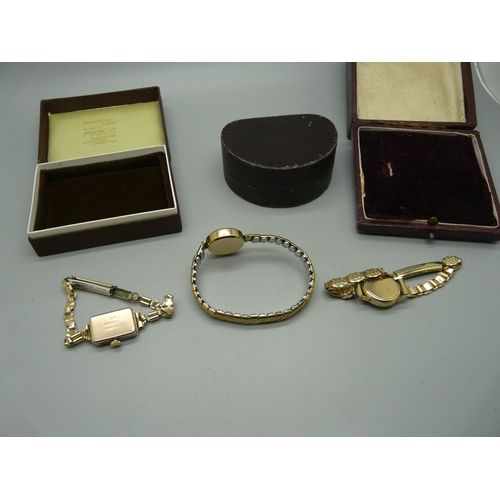 904 - Three lady's 9ct gold wristwatches on plated bracelets, including one Omega