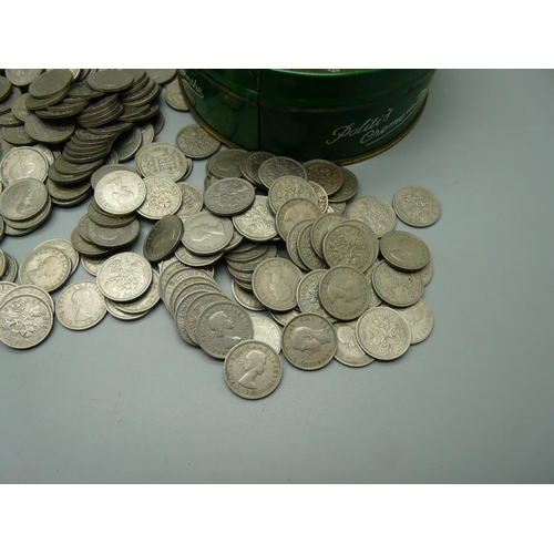 907 - A collection of coins including sixpences