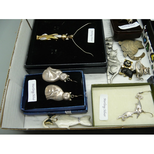 918 - A collection of cat jewellery including silver