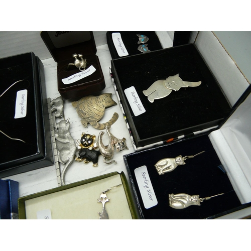 918 - A collection of cat jewellery including silver