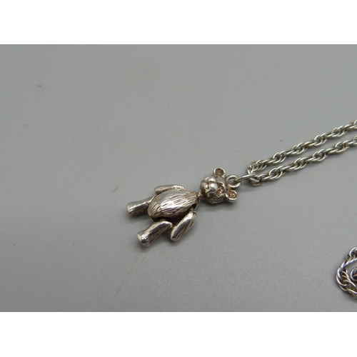 953 - A jointed silver Teddy bear pendant on a 24