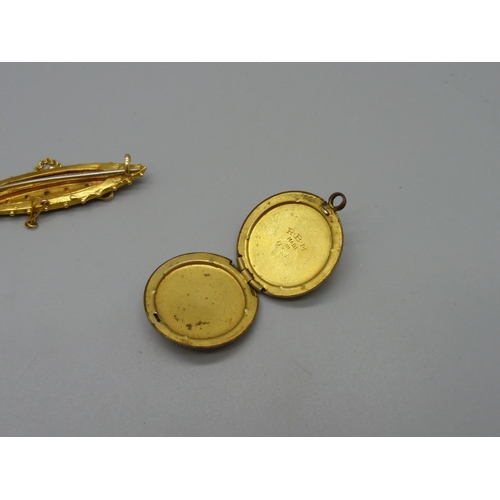 957 - A yellow metal brooch set with rose cut diamonds, marked 15ct F.B. and a plated locket marked made i... 