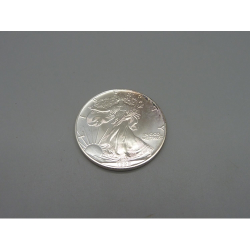 966 - A U.S. 1oz. fine silver one dollar coin, 1992