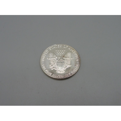 966 - A U.S. 1oz. fine silver one dollar coin, 1992