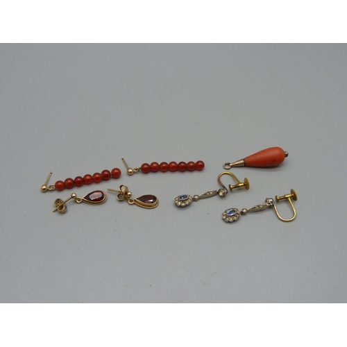 970 - A pair of 9ct gold and red stone earrings, two pairs of pendant earrings and a coral pendant