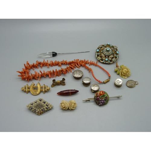 974 - A coral necklace, an Art Deco hat pin and other jewellery