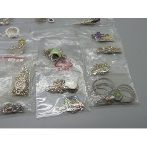 976 - Silver pendants and chains