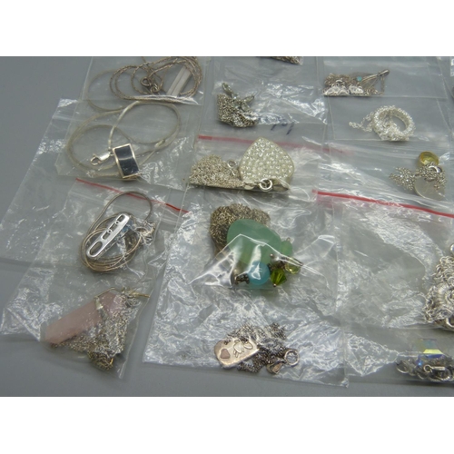 976 - Silver pendants and chains