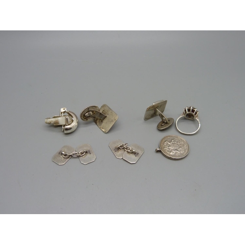 978 - Two pairs of silver cufflinks, earrings, a ring and a fob