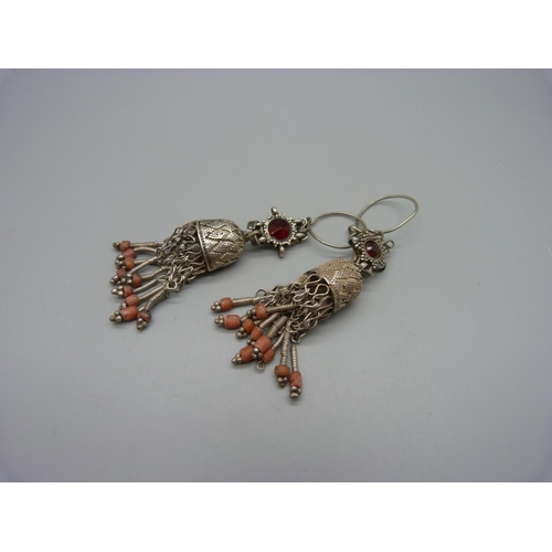 983 - A pair of white metal and coral pendant earrings