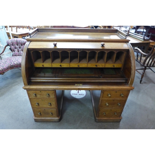 1 - A Victorian oak cylinder desk