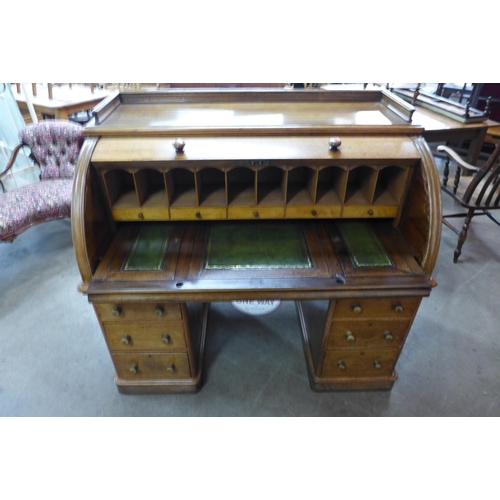 1 - A Victorian oak cylinder desk