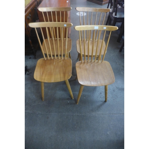 101b - A set of four beech kitchen chairs