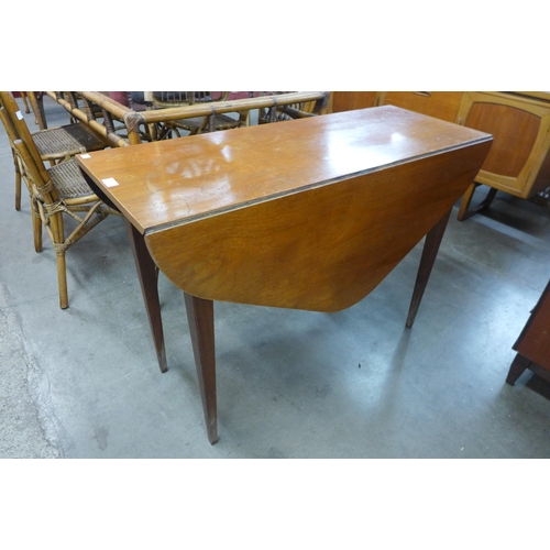 102 - A Danish teak drop-leaf table