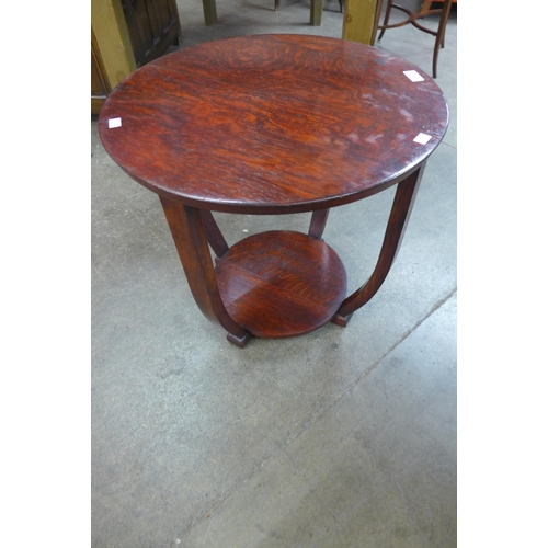 117 - An Art Deco oak circular occasional table