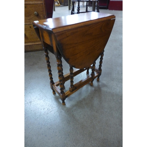 12 - A small oak barleytwist gateleg occasional table