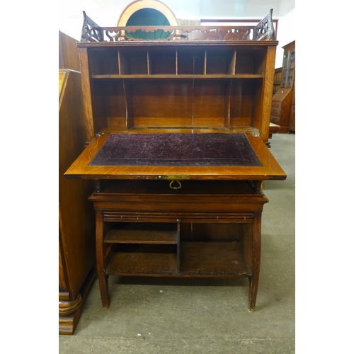 127 - A Victorian oak writing cabinet