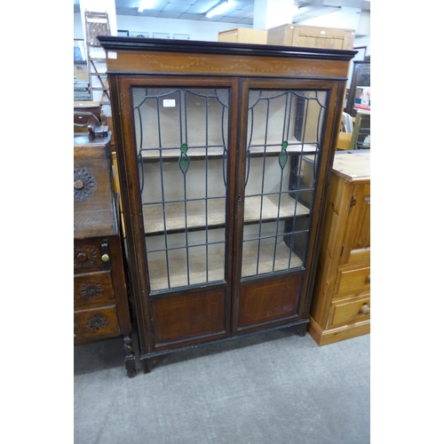 180 - An Edward VII inlaid mahogany display cabinet