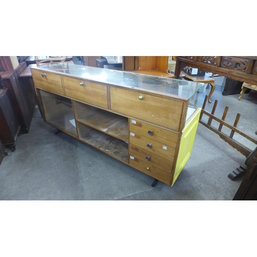 205 - A mid 20th Century painted shop counter