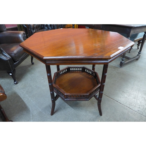 24 - A Victorian mahogany octagonal centre table