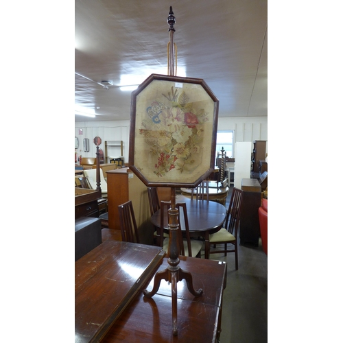 242 - A Victorian mahogany and embroidered pole screen, a/f